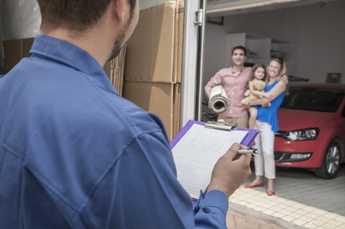 Large moving truck prepared for residential removals near Holland Park