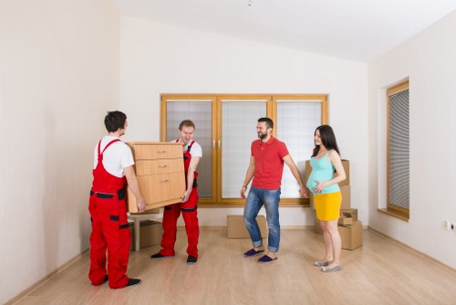 Preparing household items for a man with van collection in Holland Park