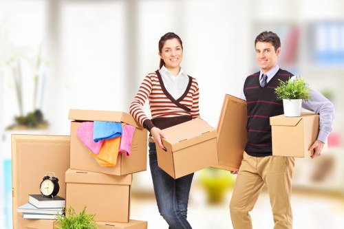 Careful loading of student belongings for a West London relocation
