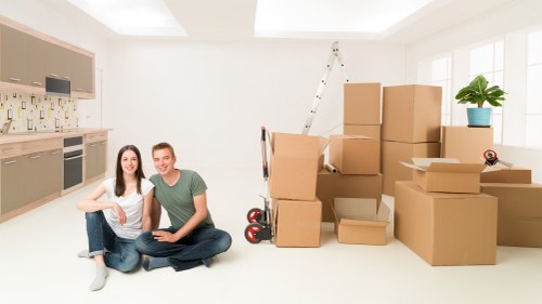 Packed moving boxes ready for transport in West London