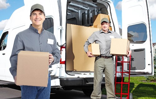 Careful loading of furniture and boxes for a local West London move