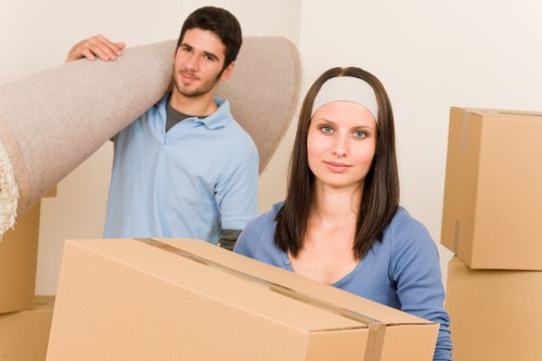 Student moving day with boxes and furniture arranged for transport
