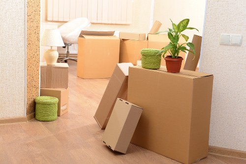 Business relocation team managing loading and transport in Holland Park