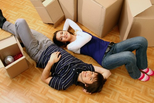 Furniture and office items being packed for a local Holland Park office move